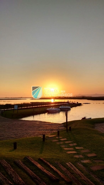 Terreno de frente a praça no condomínio Lagoa do Passo: 1ª foto da galeria de imagens do imóvel