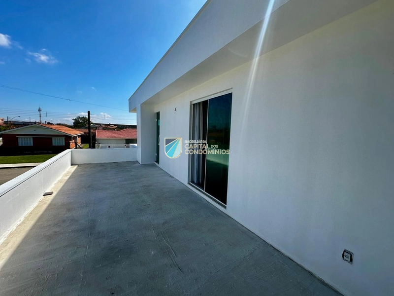 Sobrado junto ao mar no centro: 31ª foto da galeria de imagens do imóvel