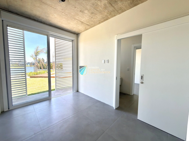 Linda casa beira lago no Condomínio Riviera: 38ª foto da galeria de imagens do imóvel