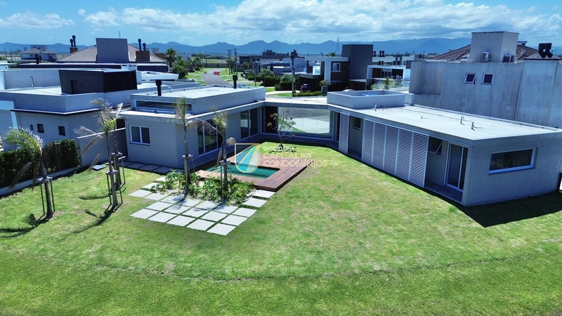 Linda casa beira lago no Condomínio Riviera: 51ª foto da galeria de imagens do imóvel