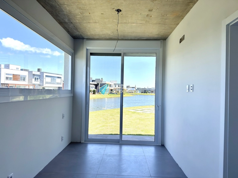 Linda casa beira lago no Condomínio Riviera: 48ª foto da galeria de imagens do imóvel