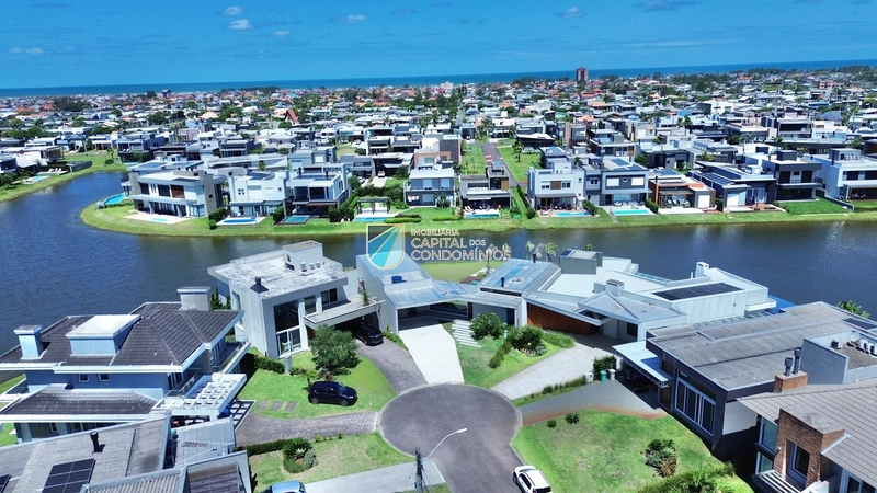 Linda casa beira lago no Condomínio Riviera: 54ª foto da galeria de imagens do imóvel