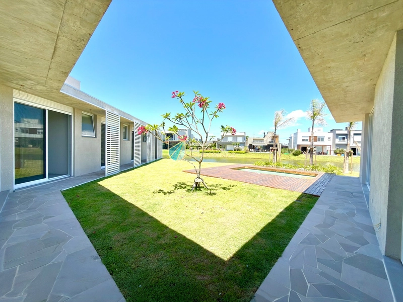 Linda casa beira lago no Condomínio Riviera: 8ª foto da galeria de imagens do imóvel