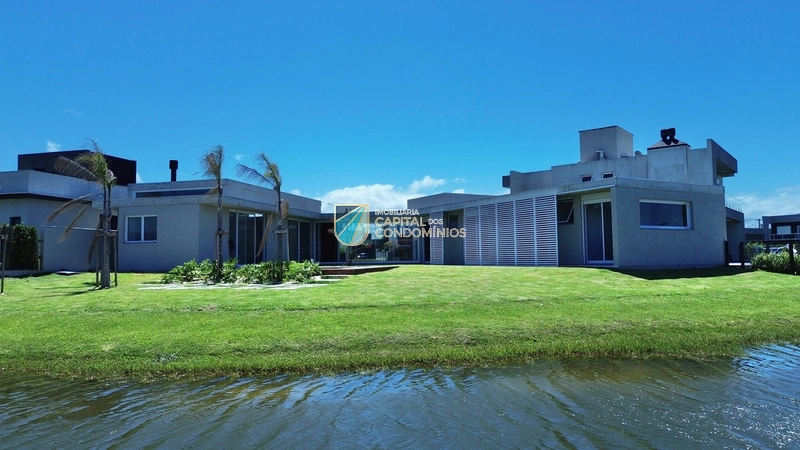 Linda casa beira lago no Condomínio Riviera: 22ª foto da galeria de imagens do imóvel