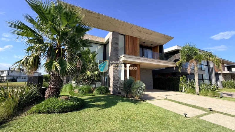 Sobrado beira lago no condomínio Sense em Xangri-lá: 2ª foto da galeria de imagens do imóvel