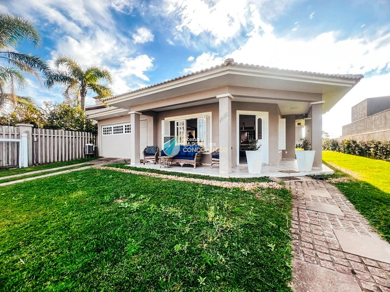 Casa térrea em Atlântida: 2ª foto da galeria de imagens do imóvel