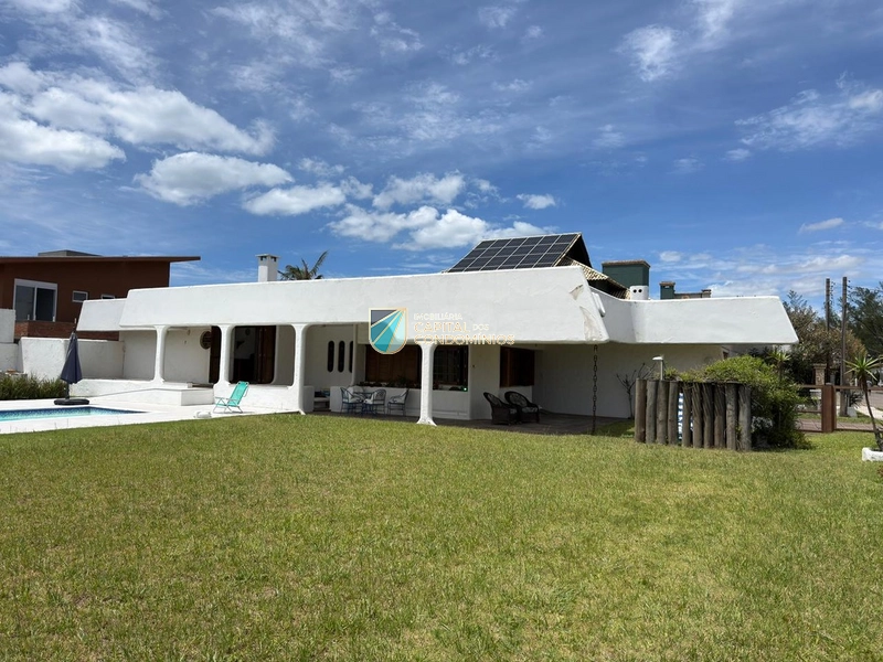 Casa térrea em Atlântida: 3ª foto da galeria de imagens do imóvel