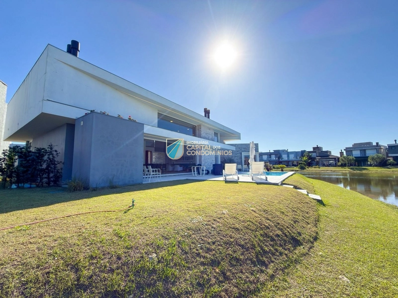 Casa térrea beira lago no Riviera em Xangri-lá: 5ª foto da galeria de imagens do imóvel