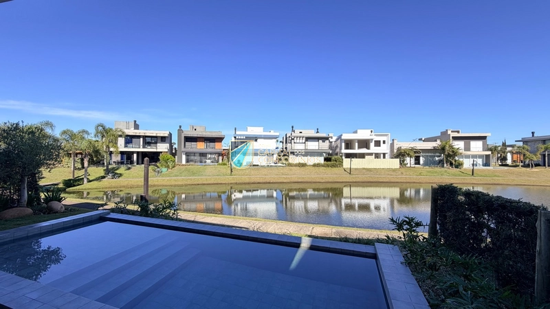 Sobrado beira lago no Capão Ilhas Resort: 5ª foto da galeria de imagens do imóvel