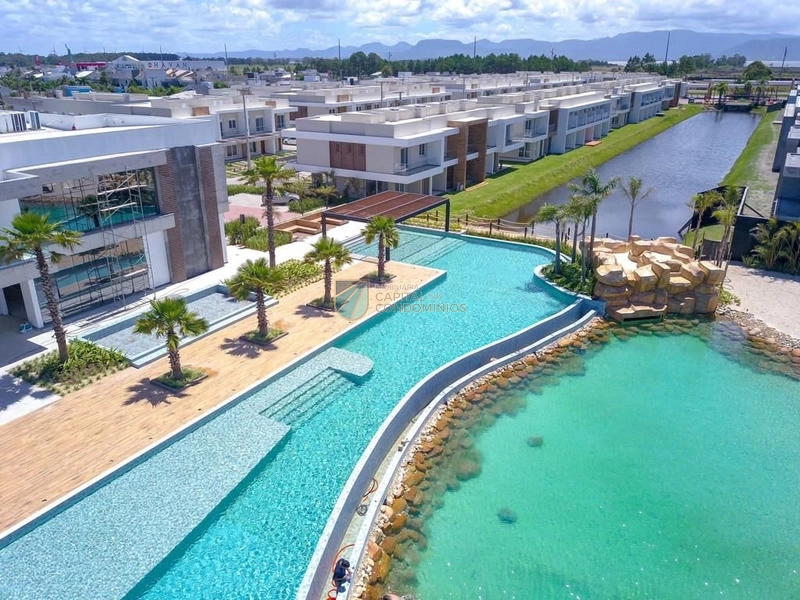 Sobrados em condomínio com infraestrutura completa em Capão da Canoa: 3ª foto da galeria de imagens do imóvel