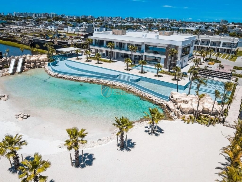 Sobrados em condomínio com infraestrutura completa em Capão da Canoa: 2ª foto da galeria de imagens do imóvel