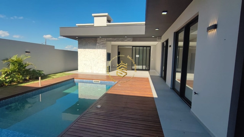CASA COM 03 SUÍTES, 4 VAGAS DE GARRAGEM.: 9ª foto da galeria de imagens do imóvel