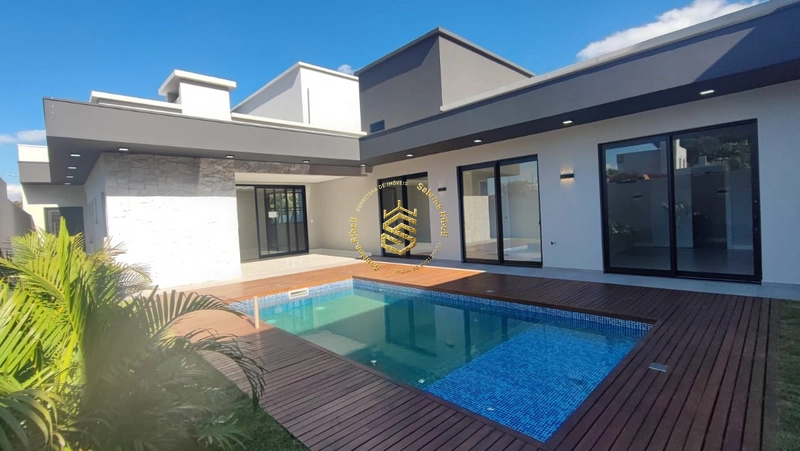 CASA COM 03 SUÍTES, 4 VAGAS DE GARRAGEM.: 7ª foto da galeria de imagens do imóvel