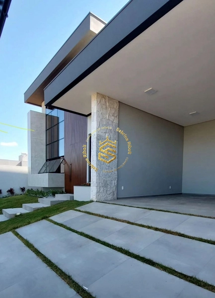 CASA COM 03 SUÍTES, 4 VAGAS DE GARRAGEM.: 3ª foto da galeria de imagens do imóvel