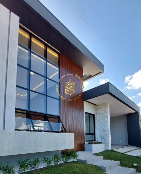 CASA COM 03 SUÍTES, 4 VAGAS DE GARRAGEM.: 1ª foto da galeria de imagens do imóvel
