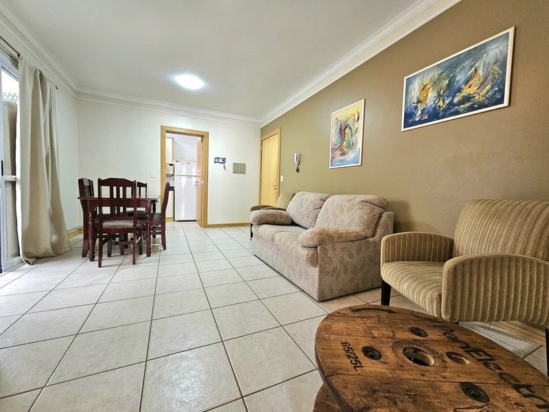 Amplo apartamento de 1 dormitório com box de garagem em Capão da Canoa: 3ª foto da galeria de imagens do imóvel