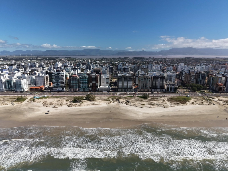 APARTAMENTO 2 DORMITÓRIOS EM FRENTE A PRAÇA EM CAPÃO DA CANOA: 32ª foto da galeria de imagens do imóvel