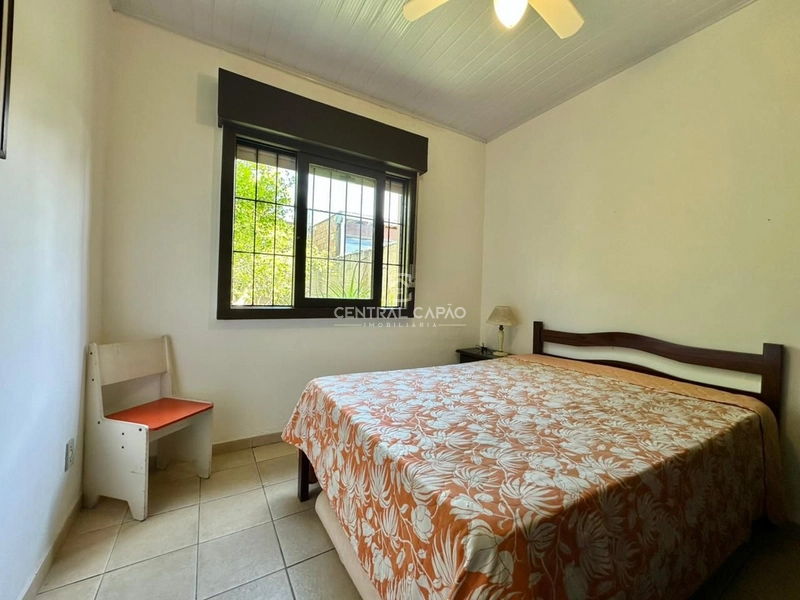 CASA COM 3 TERRENOS APENAS 2 QUADRAS DO MAR À VENDA EM CAPÃO DA CANOA: 17ª foto da galeria de imagens do imóvel