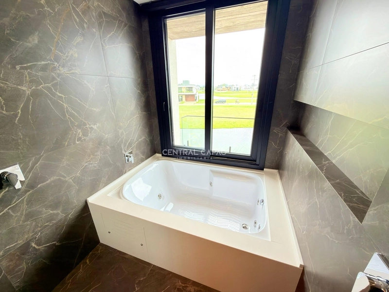 Sobrado beira lago em condomínio alto padrão à venda em Xangri-Lá: 40ª foto da galeria de imagens do imóvel