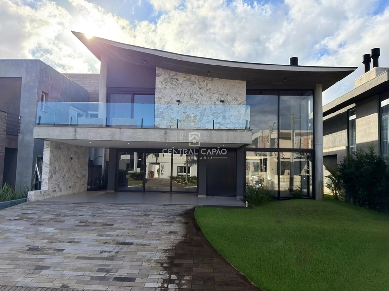 Casa 5 suítes no condomínio Velas da Marina à venda