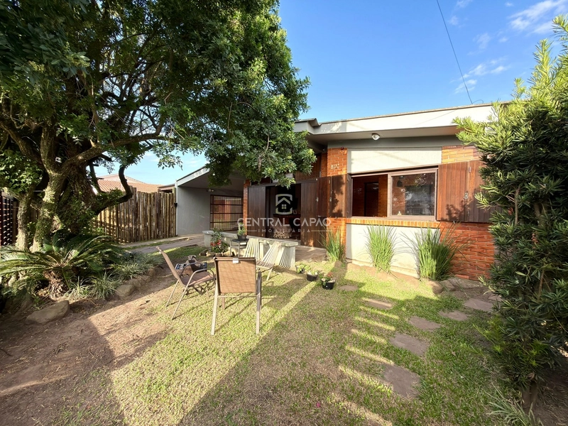 Casa 3 dormitórios à venda no centro de Xangri-Lá: 1ª foto da galeria de imagens do imóvel