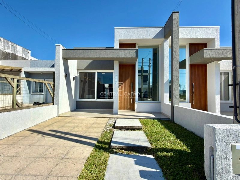 Casa geminada pronta pra morar à venda em Capão da Canoa: 1ª foto da galeria de imagens do imóvel