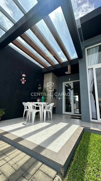 Casa de três dormitórios em Xangri-lá: 2ª foto da galeria de imagens do imóvel