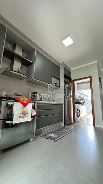 Casa de três dormitórios em Xangri-lá: 4ª foto da galeria de imagens do imóvel