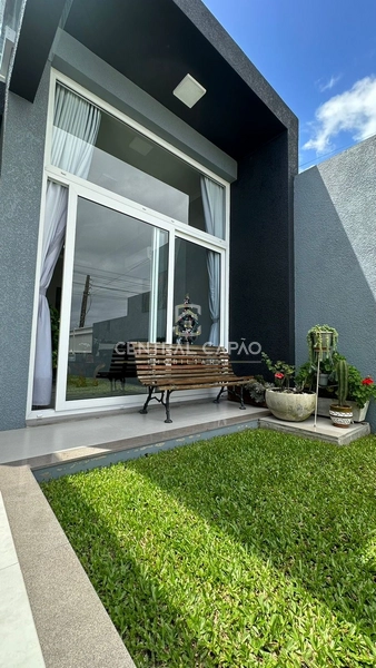 Casa de três dormitórios em Xangri-lá: 3ª foto da galeria de imagens do imóvel