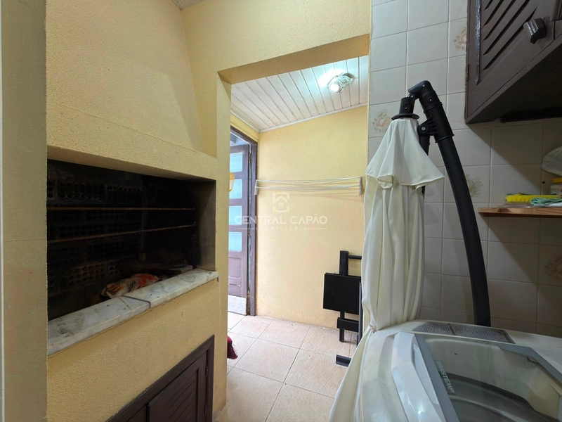 Sobrado em condomínio com piscina em Capão Novo: 8ª foto da galeria de imagens do imóvel