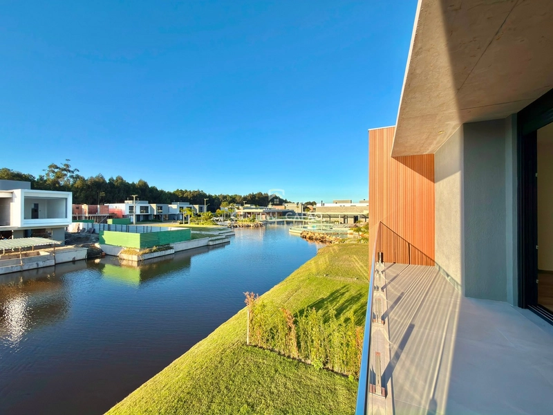 Casa beira lago no condomínio Amaná em Atlântida: 17ª foto da galeria de imagens do imóvel