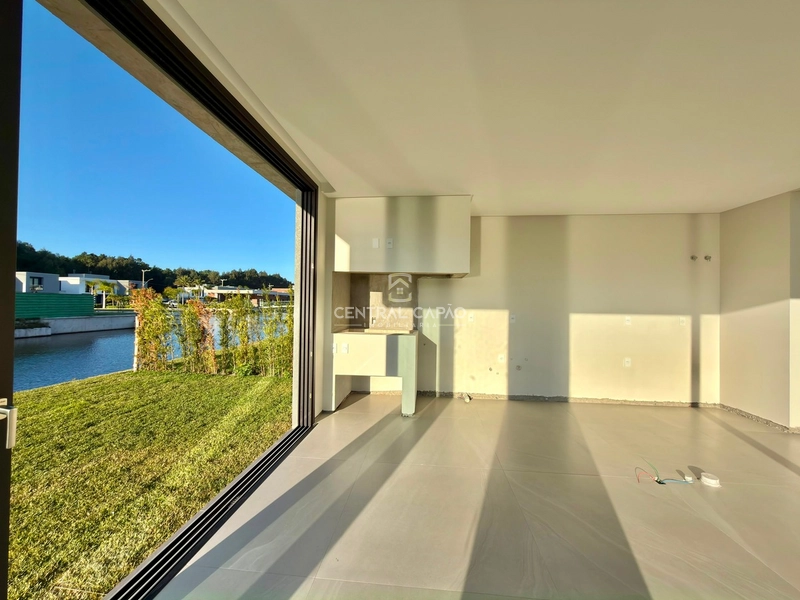Casa beira lago no condomínio Amaná em Atlântida: 10ª foto da galeria de imagens do imóvel