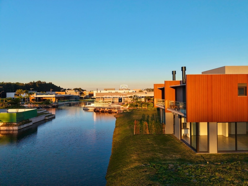 Casa beira lago no condomínio Amaná em Atlântida: 31ª foto da galeria de imagens do imóvel