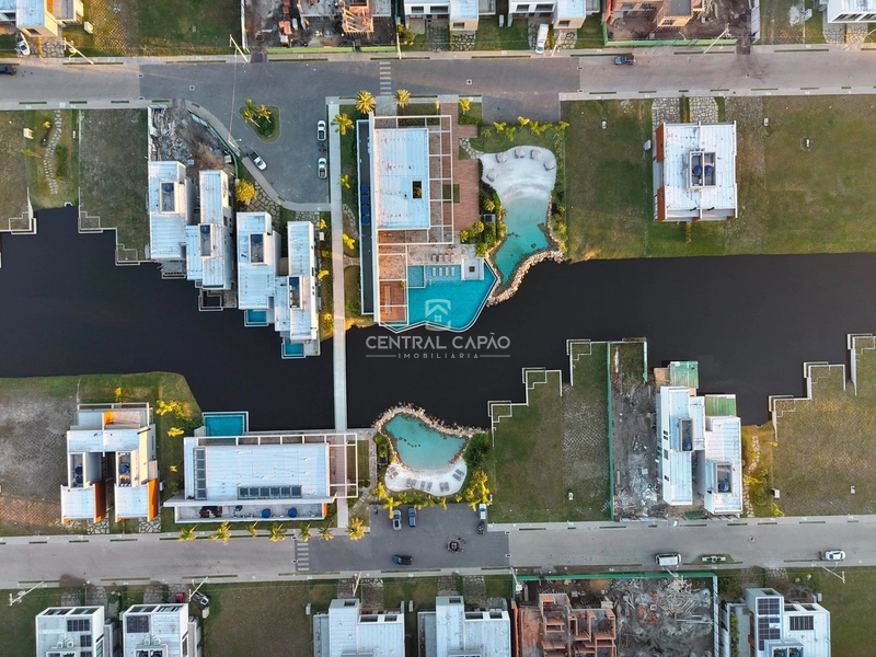 Casa beira lago no condomínio Amaná em Atlântida: 35ª foto da galeria de imagens do imóvel