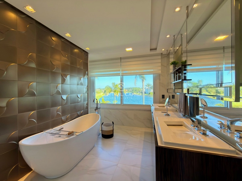 Casa 4 suítes beira lago no condomínio Bosques de Atlântida: 57ª foto da galeria de imagens do imóvel