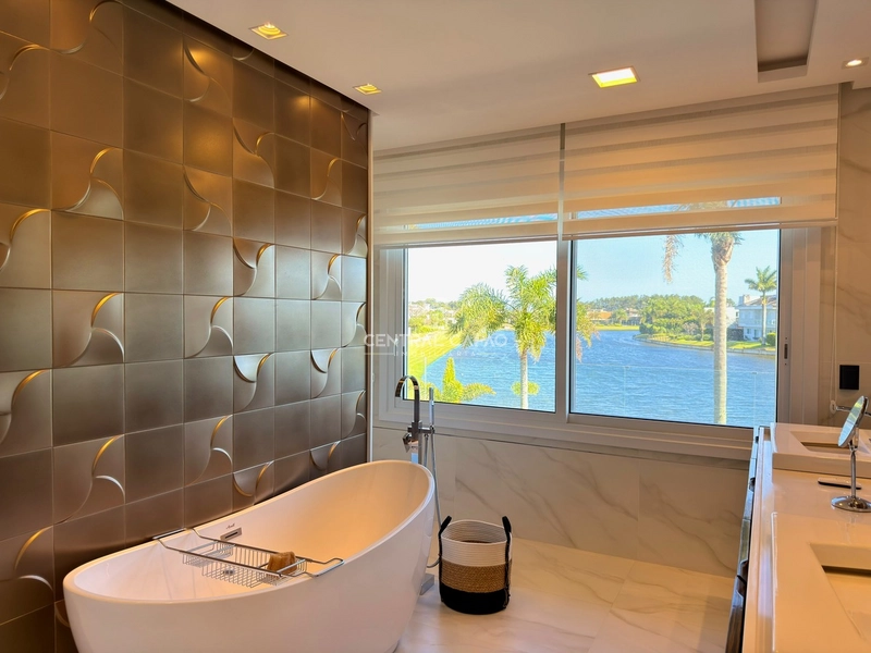 Casa 4 suítes beira lago no condomínio Bosques de Atlântida: 60ª foto da galeria de imagens do imóvel