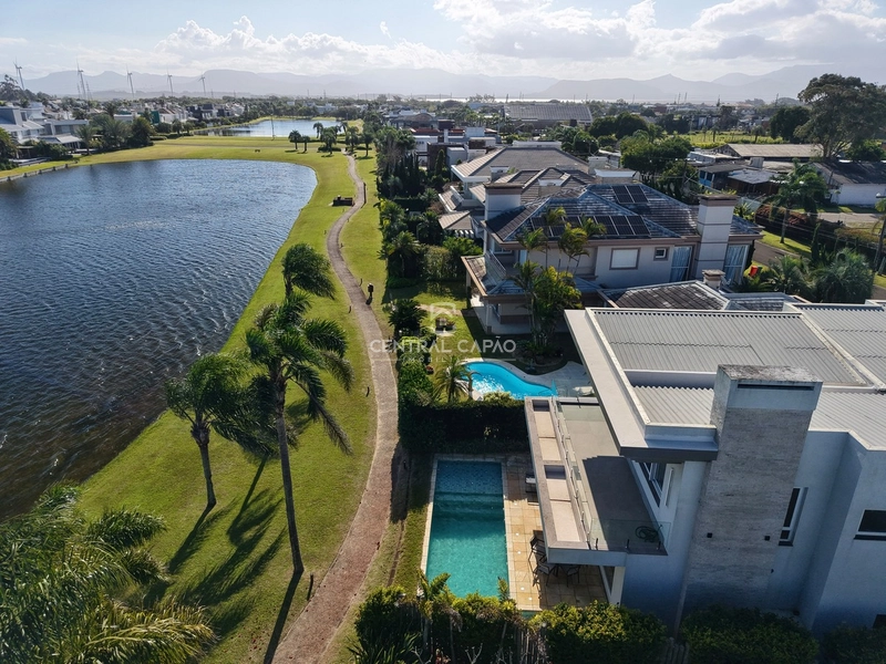 Casa 4 suítes beira lago no condomínio Bosques de Atlântida: 71ª foto da galeria de imagens do imóvel