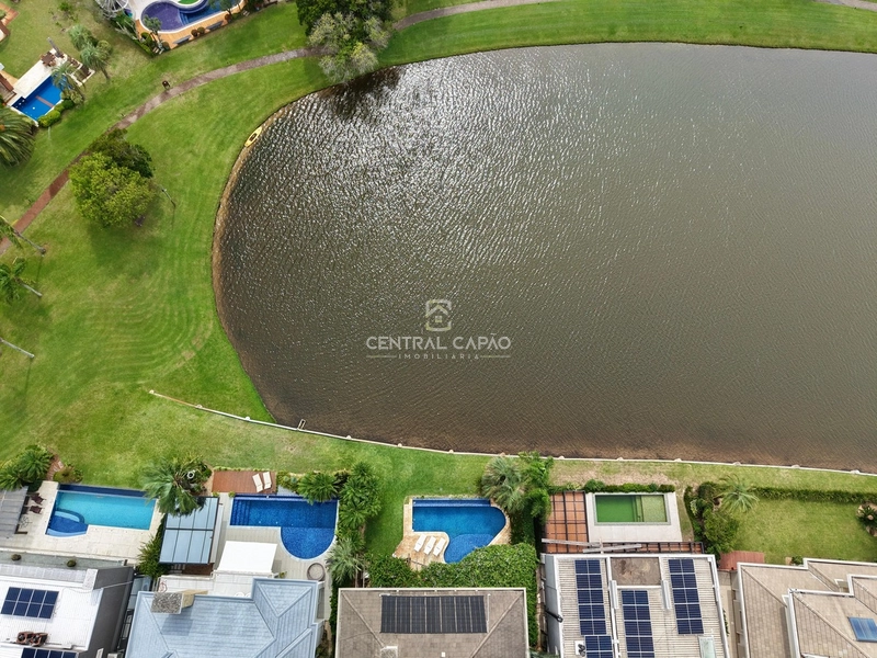 Sobrado 5 suítes beira lago à venda no Bosques de Atlântida: 3ª foto da galeria de imagens do imóvel