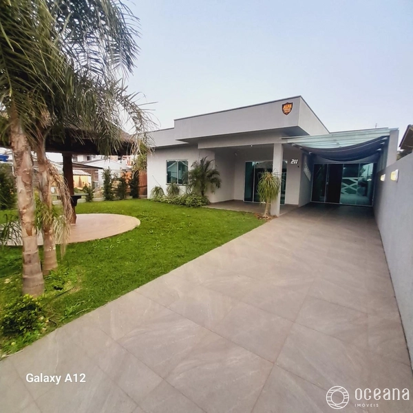 Casa com 04 dormitório na Praia Real/Torres: 1ª foto da galeria de imagens do imóvel