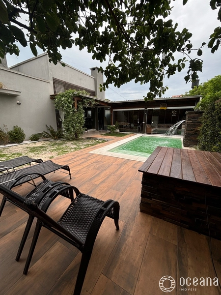 Casa 3 dormitórios com piscina, mobiliada e decorada em Atlântida.: 1ª foto da galeria de imagens do imóvel