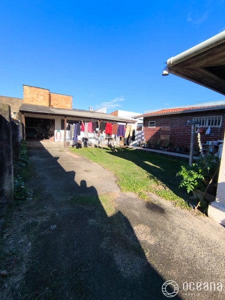 terreno com 3 casas com alto potencial comercial em capao da canoa: 31ª foto da galeria de imagens do imóvel