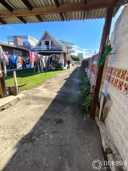 terreno com 3 casas com alto potencial comercial em capao da canoa: 28ª foto da galeria de imagens do imóvel