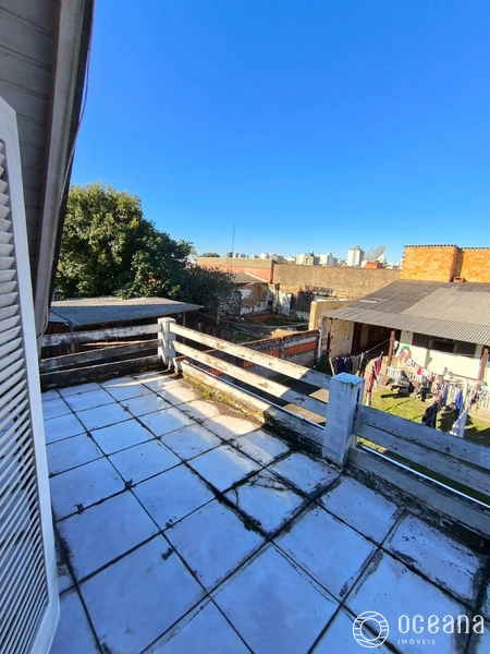 terreno com 3 casas com alto potencial comercial em capao da canoa: 3ª foto da galeria de imagens do imóvel
