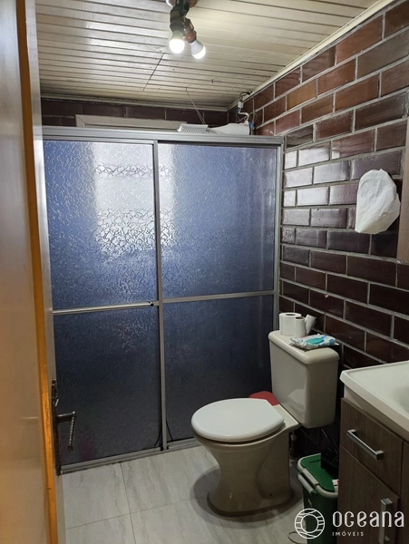 terreno com 3 casas com alto potencial comercial em capao da canoa: 10ª foto da galeria de imagens do imóvel