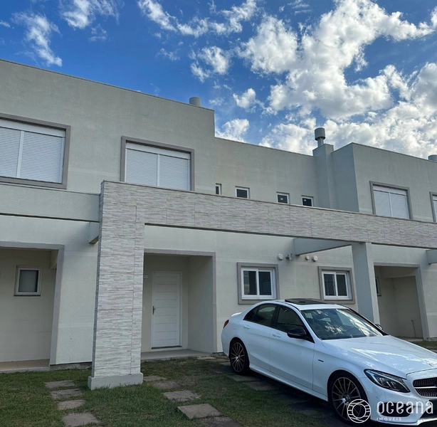 CASA DE 03 AMPLOS DORMITÓRIOS EM CONDOMÍNIO FECHADO - XANGRI-LÁ: 1ª foto da galeria de imagens do imóvel