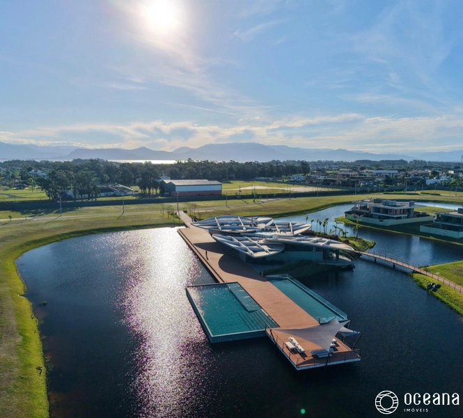 TERRENO EM CONDOMÍNIO FECHADO BEIRA LAGO - ACEITA IMÓVEL E AUTOMÓVEL: 1ª foto da galeria de imagens do imóvel