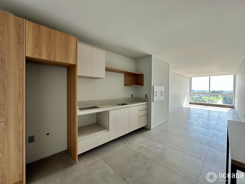 Apartamento de 02 dormitórios de Frente para a avenida Central de Atlâ