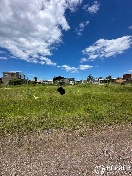 Terreno a venda em Capao da Canoa: 1ª foto da galeria de imagens do imóvel