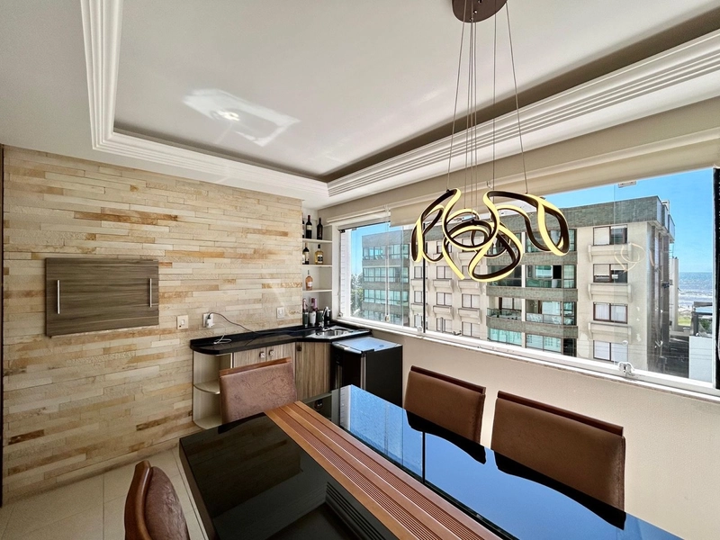 APARTAMENTO COM VISTA MAR AO LADO DA PRAÇA LUIZ BASSANI: 1ª foto da galeria de imagens do imóvel