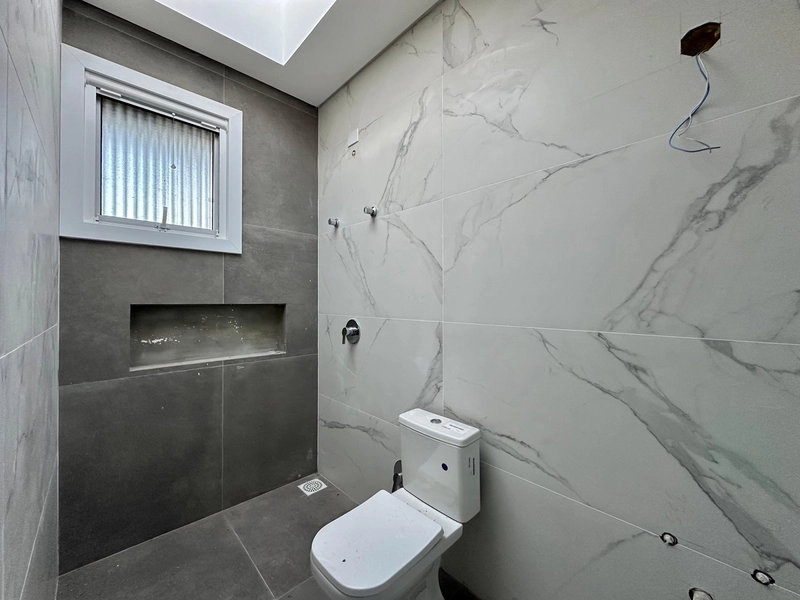 EXCELENTE CASA COM 04 SUÍTES EM CONDOMÍNIO FECHADO EM XANGRI-LÁ: 15ª foto da galeria de imagens do imóvel